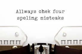 typewriter with "Allways chek four spelling misteaks" representative of commonly misspelled words