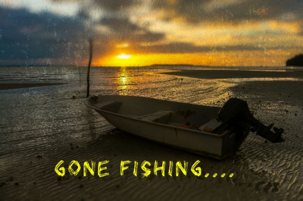 a rowboat on the beach at sunset with the words "Gone Fishing..."