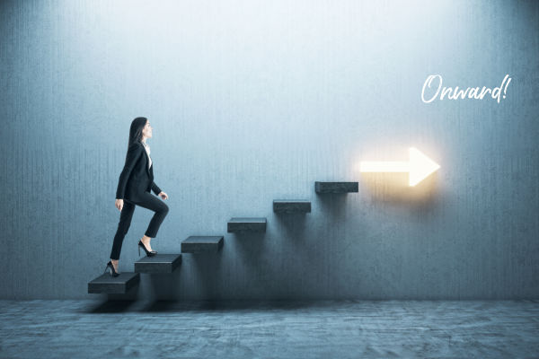 A woman walks up stairs toward a lit arrow pointing forward and the text reading Onward.